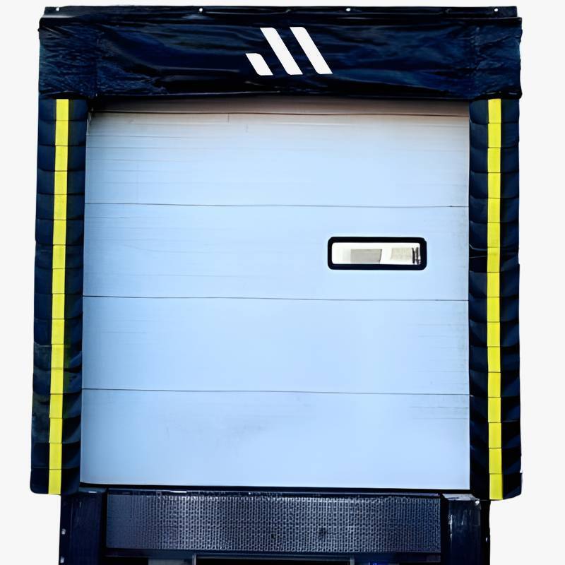 Close-up of a high-performance dock shelter and hydraulic dock leveler plate installation.